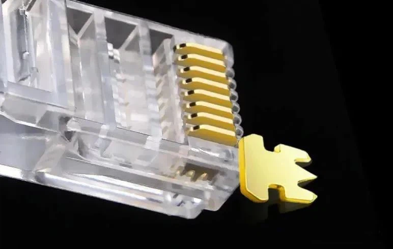 Cat6 RJ45 plug with three contact points for compression. Cat6 RJ45 plug with three contact points for compression.